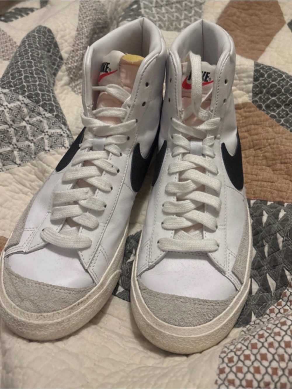 Nike White High-Top Sneakers with Black Swoosh